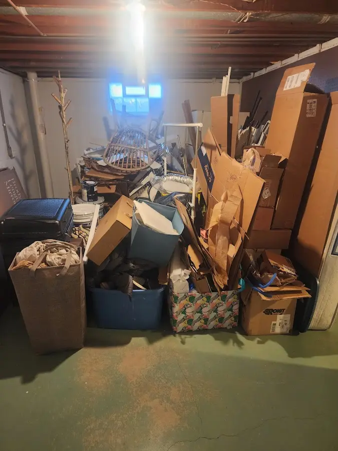 Roll-off dumpster container at job site for 2 Yard Dumpster Rental in Basehor